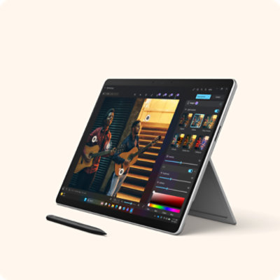 A Slim Pen and a Surface Pro for Business with the built-in kickstand engaged. 