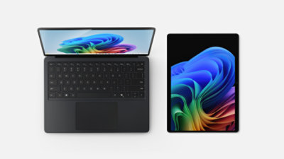 Black Surface Laptop and Surface Pro viewed from above.