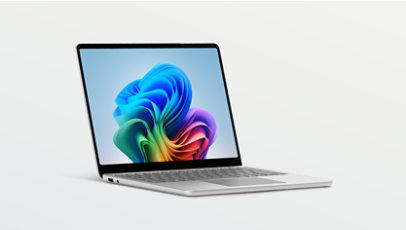 An angled view shows a Surface Laptop, Copilot+ PC, 13-inch in the colour Platinum.