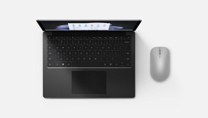 A Surface Laptop 5 and a Microsoft Modern Mouse.