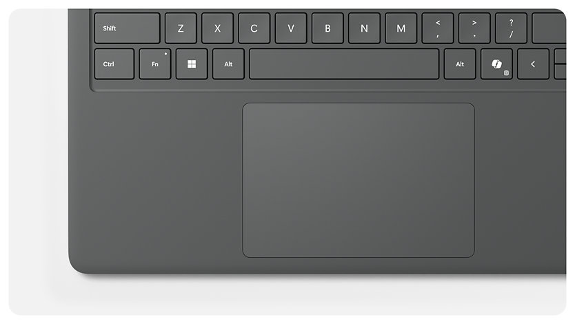 A top-down view shows the redesigned palm rest on the 13.8-inch Surface Laptop for Business with 5G.