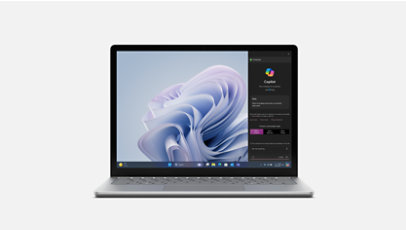 A front view of Surface Laptop 6 for Business in platinum with Copilot menu on screen.