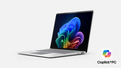 A platinum Surface Laptop for Business, Copilot Plus PC facing left.