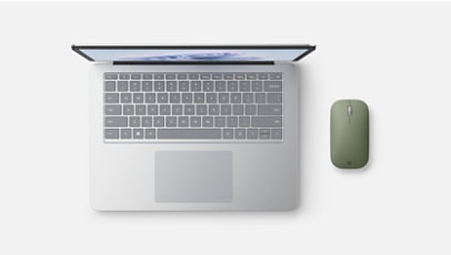 A Surface Laptop Studio 2 and a Microsoft Modern Mobile Mouse.
