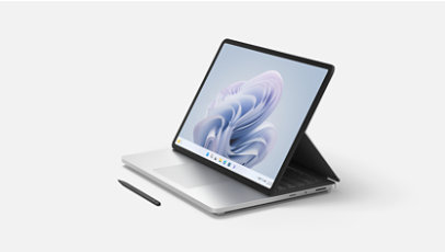 A Surface Laptop Studio 2 in stage mode with a Surface Slim Pen 2. 