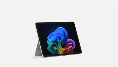 A 12-inch Surface Pro platinum in kickstand mode, facing right.