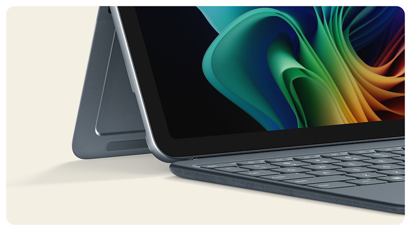 A side view of a Surface Pro 12-inch Keyboard and a Surface Pro both in the colour Ocean.