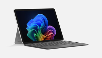 A Surface Pro in laptop mode with the kickstand engaged and connected to a Surface Pro 12-inch Keyboard. 