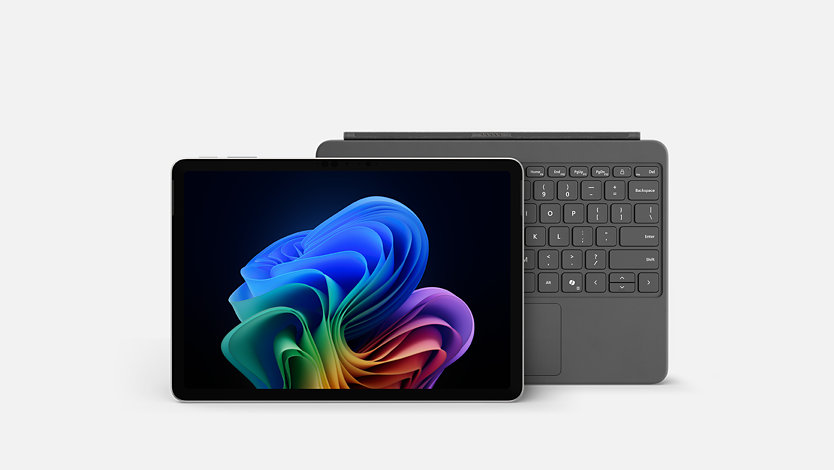 A Surface Pro Copilot Plus PC, 12-inch in the color platinum, bundled with a Slate keyboard.