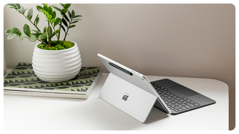 A Surface Pro 12-inch Keyboard for Business is attached to a Surface Pro for Business, showing how the device can be turned into a traditional laptop experience.