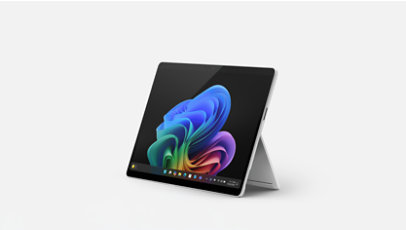A-13-inch Surface Pro platinum in kickstand mode, facing left.