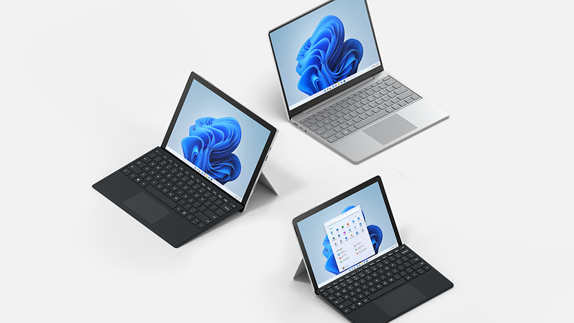 En Surface Laptop Go och två Surface-surfplattor.