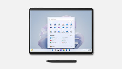 Un dispositivo Surface Pro 9 platino in modalità tablet.