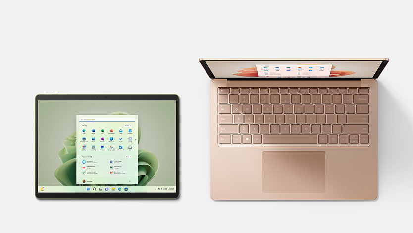 A forest green Surface Pro 9 and a Sandstone pink Surface Laprtop 5