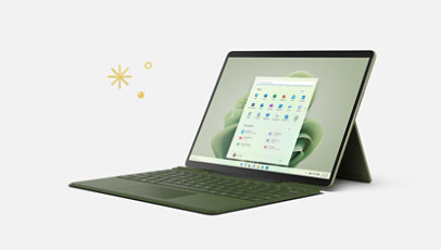 Un Surface Pro 9 con tastiera cover nei colori Forest e Sapphire.