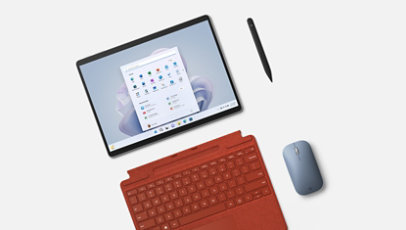 Un Surface Pro 9, una tastiera Pro Signature e una penna Slim Pen 2 con mouse mobile in colore blu ghiaccio. 