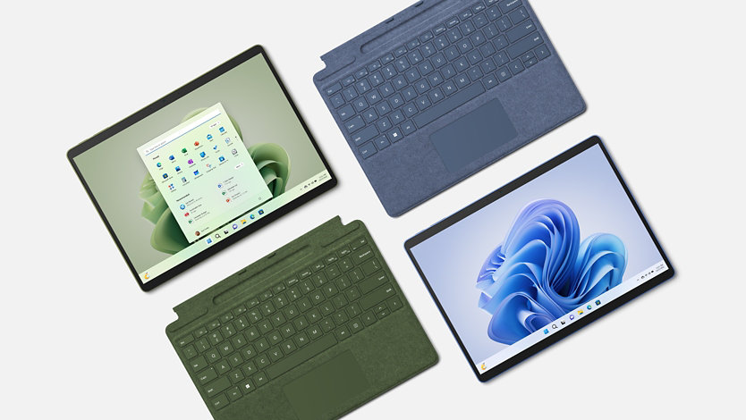 Un dispositivo Surface Pro 9 con funda con teclado en colores bosque y zafiro.