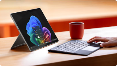 A person using a Surface Pro for Business and a detached Surface Pro 13-inch Flex Keyboard for Business.