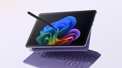 A violet, 12-inch Surface Pro, Copilot+ PC, with a matching keyboard and a slim pen.