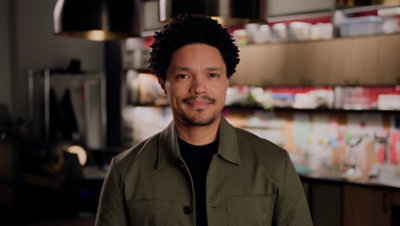 A front view of Trevor Noah.