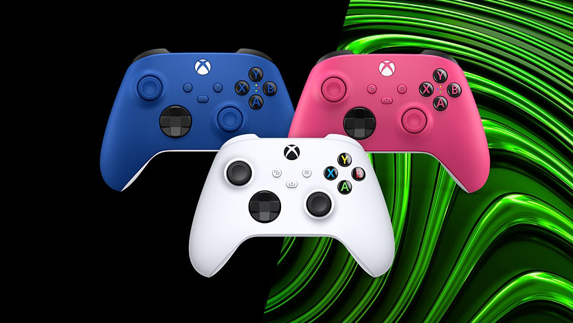 Drie Xbox-controllers in Shock Blue, Robot White en Deep Pink.