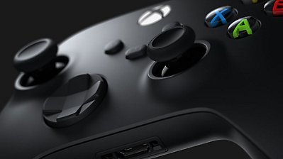 A closeup of the buttons of a black XBOX Wireless Controller.