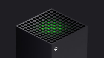 A closeup of the speaker grill on a black Xbox Series X.