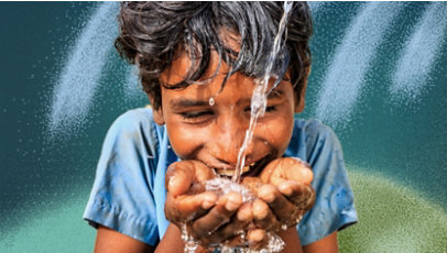 A child joyfully drinking water from a flowing stream.