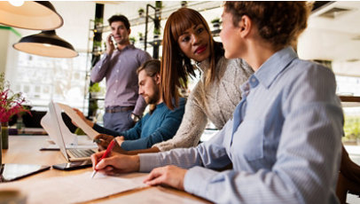 Group of people working together in the office.
