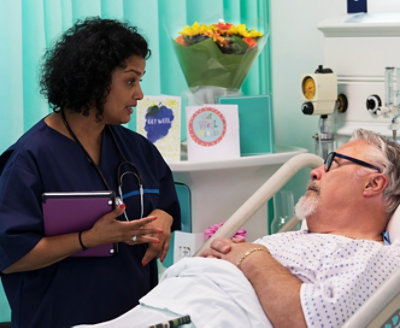 A nurse attending a patient in a hospital