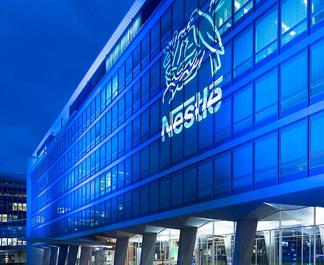 Nestle logo on top of the building