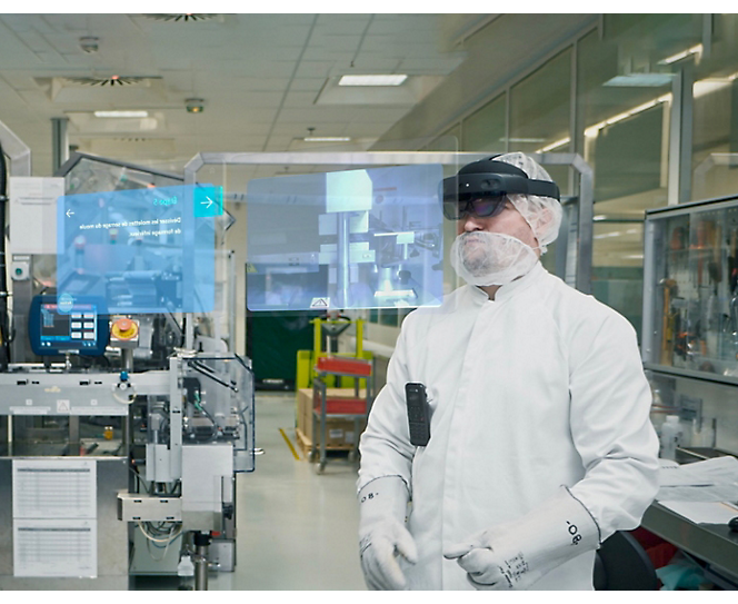 A person in lab wearing safety suit