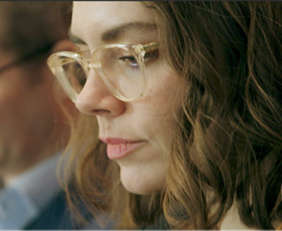 A woman in spectacles