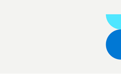 Abstract composition of blue geometric shapes on a white background.