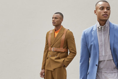 A photo of two people standing