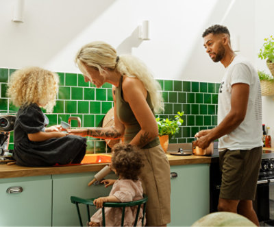 A group of people in a kitchen