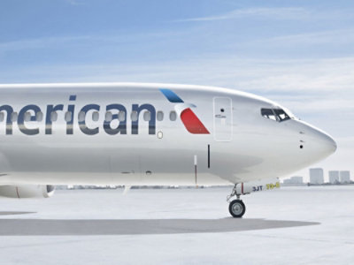 A large white airplane on a runway
