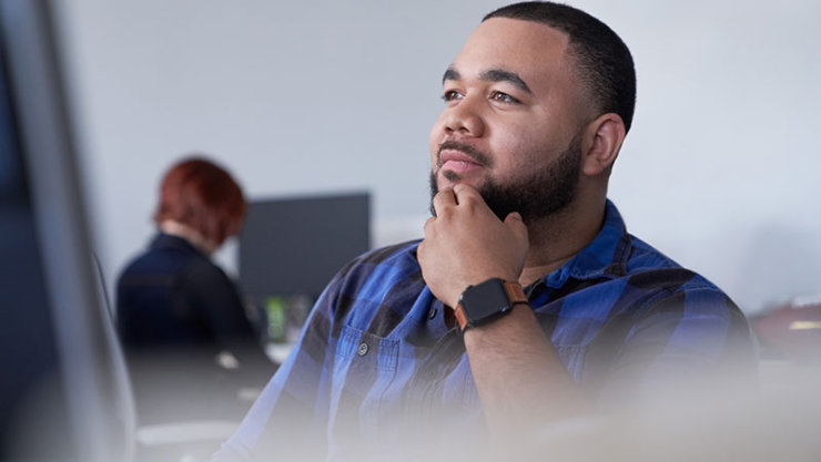 A man looking at screen