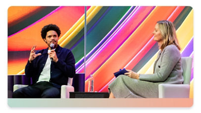 Trevor Noah and Kate Behncken, Microsoft Philanthropies Corporate Vice President,on stage at the Global Nonprofit Leader Summit