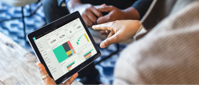 A person pointing at a tablet