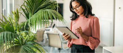 A person holding a tablet