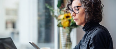 A person looking at a tablet