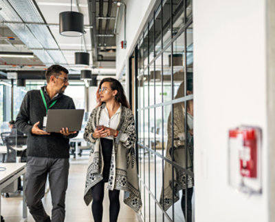 Two persons talking with each other