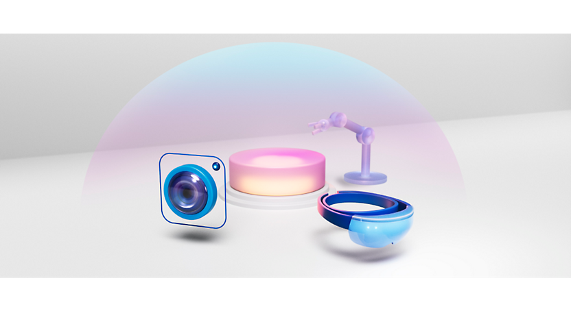 Obrázek různých produktů včetně fotoaparátu, světelného kroužku, sluchátka a náramku na bílém povrchu