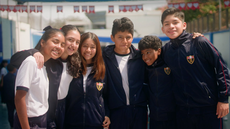 A group of students posing together outdoors.