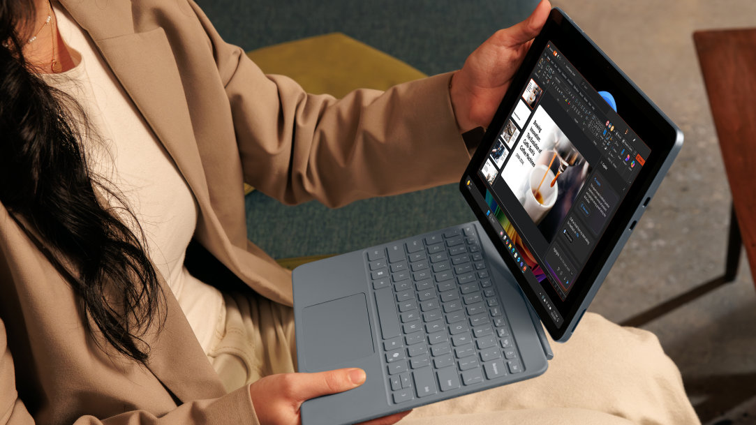 An image of a woman using a Surface Pro