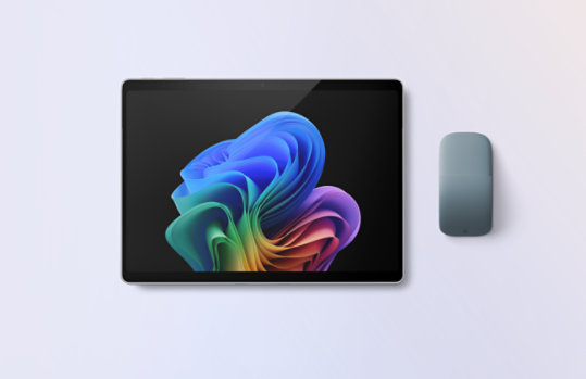 A platinum, 13-inch Surface Pro with an Ocean Arc Mouse.