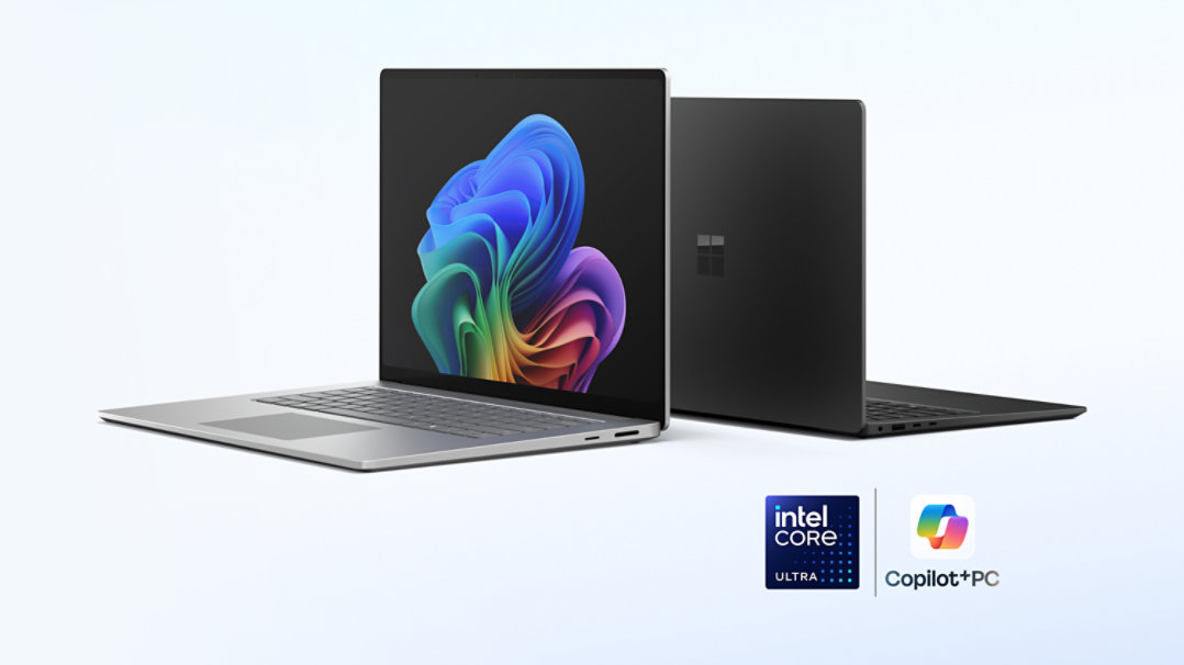A 15-inch Surface Laptop for Business in the color Platinum and a 13.8-inch Surface Laptop for Business in the color Black, Copilot Plus PCs with Intel® processors, displayed back-to-back. 