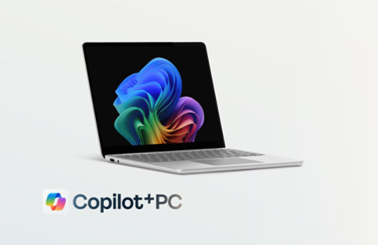 A 13 inch, platinum Surface Laptop Copilot+ PC. 