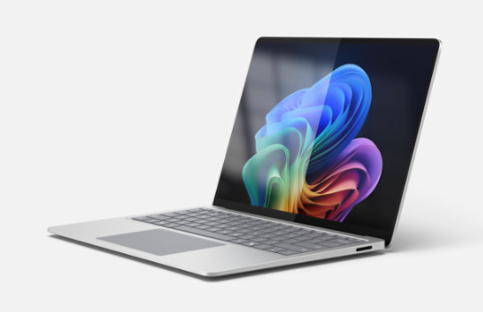 A Surface Laptop for Business is open, showing the anti-reflective display.